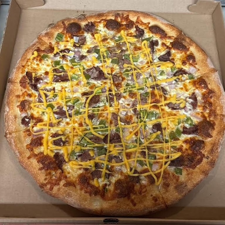 Indulge in Our Cheesesteak